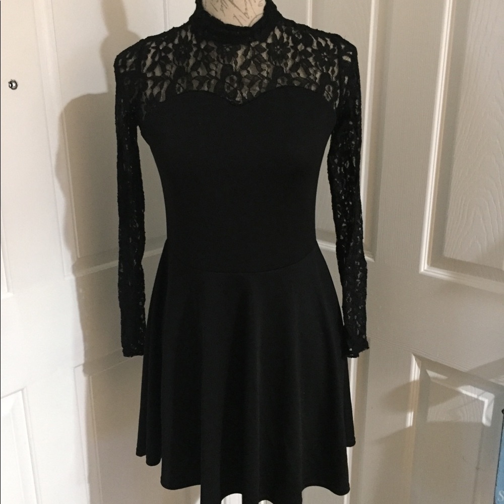 Black dress with lace top/sleeves. Size small.